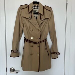 Burberry S/S Trench Coat with original tag and garment bag.
